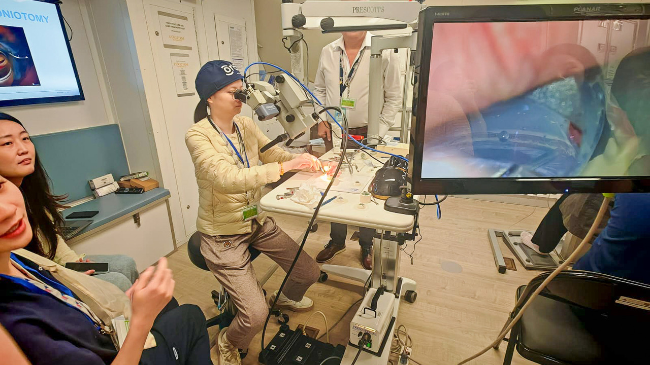 Orbis personnel demonstrate simulated glaucoma surgery